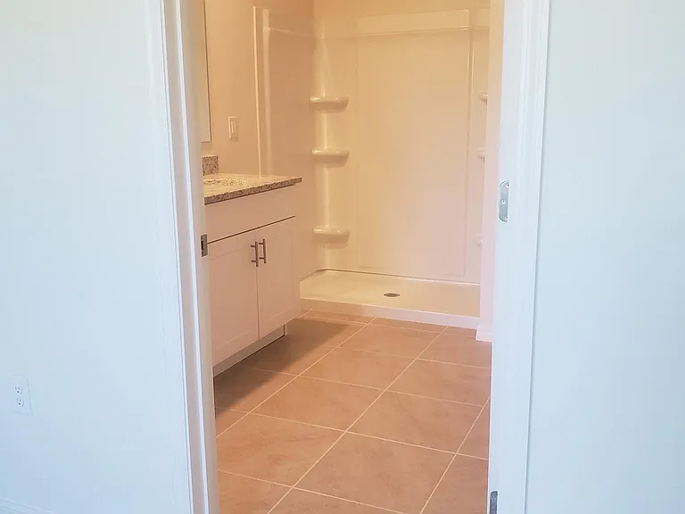 Master bathroom suite with double sink granite vanity. Large walk-in shower & separate water closet.