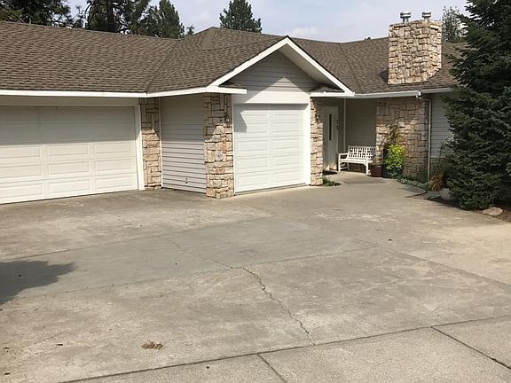 Street view, three car garage with offstreet parking
