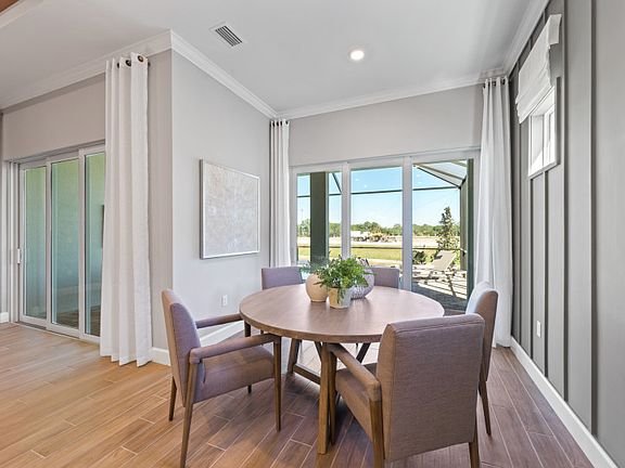 Cafe dining space with sliding glass door to lanai