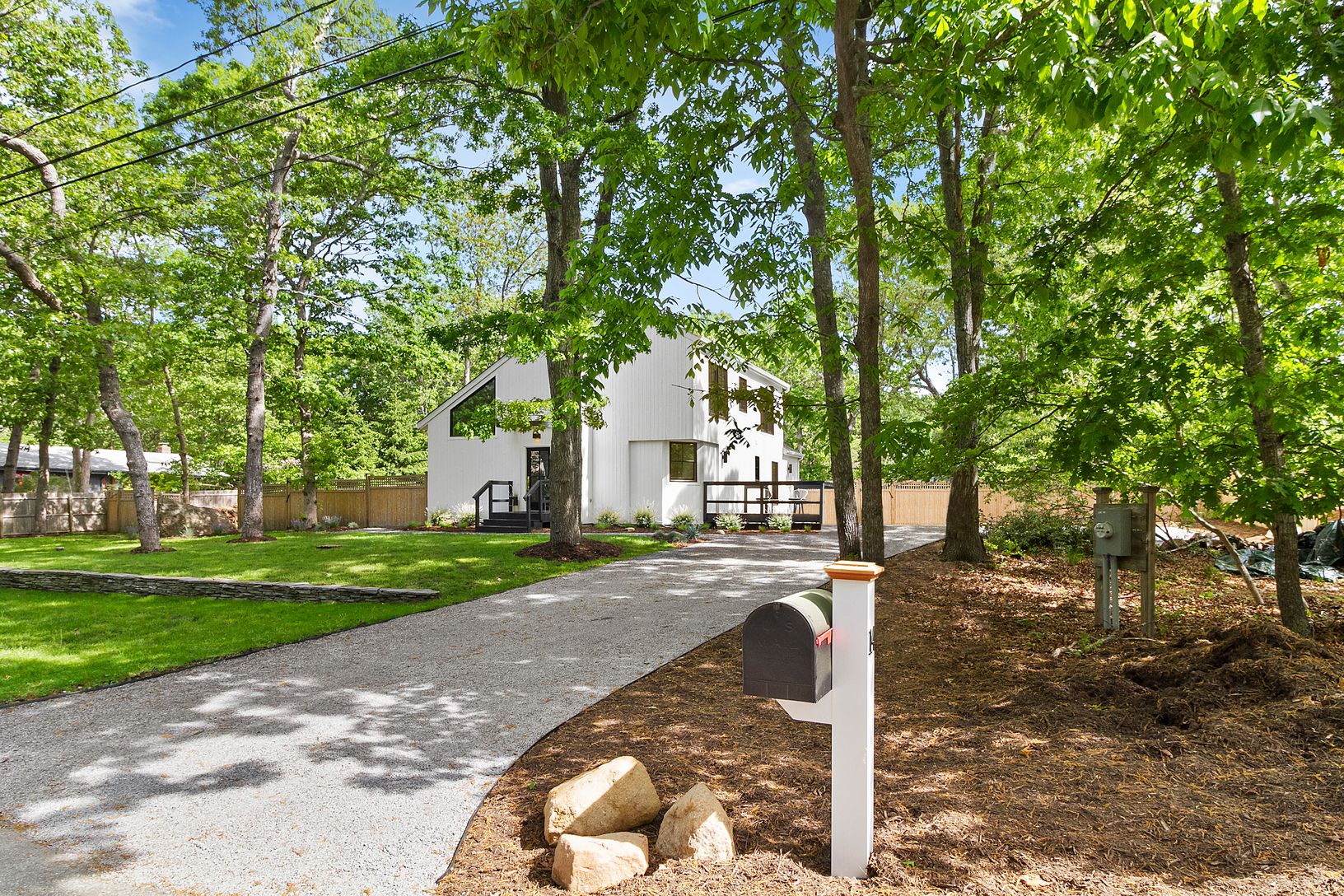  Nice curb appeal with mature trees.