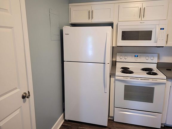 appliances and fridge, electric, HVAC located off of kitchen too