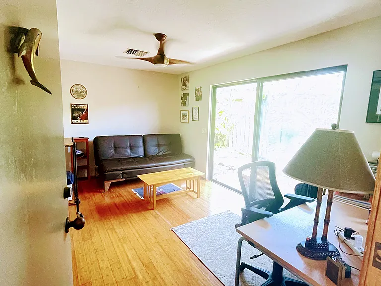 Living room with access to the patio