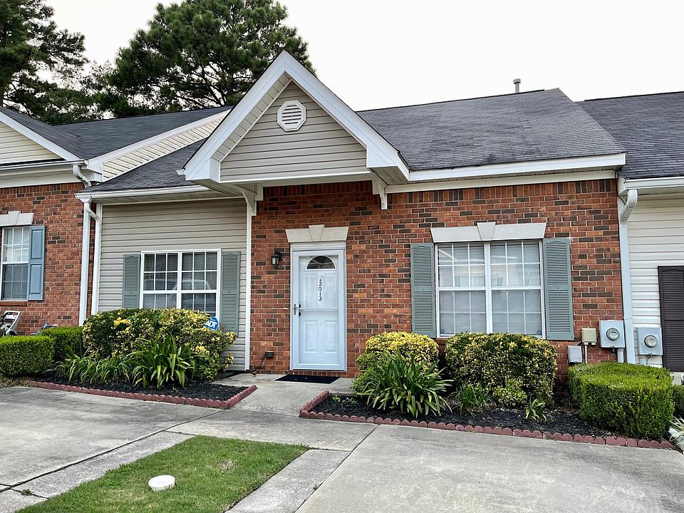 Front view with parking spots