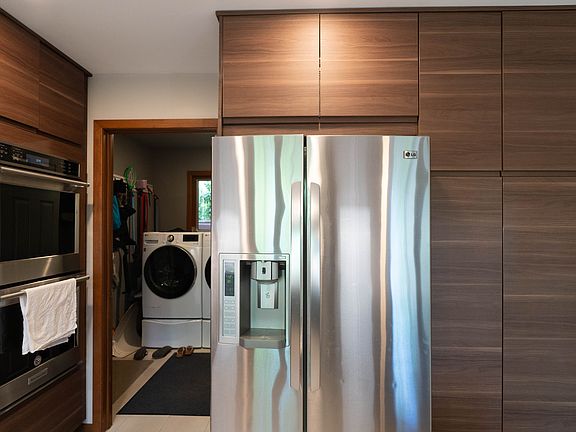 Back: washer and dryer; Front: kitchen