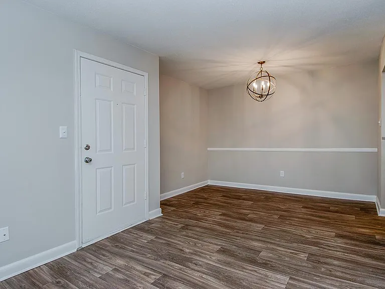 WOOD-STYLE FLOORING AT MADISON LANDING AT RESEARCH PARK AND THE COTTAGES APARTMENTS