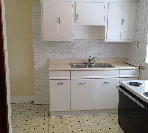 A very nice kitchen with a stove ready for you!