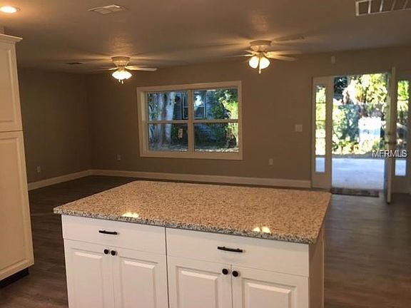 Kitchen living area connects perfectly for family gatherings or entertaining.