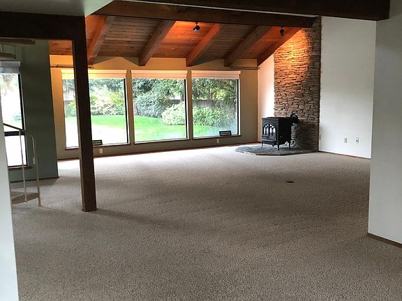 Spacious Great Room. Year old carpet. Mood lighting in cedar ceiling.