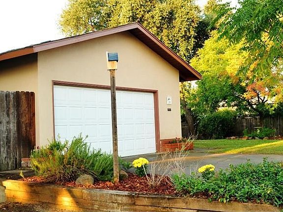 Two car, oversized garage with open rafters for storing your gear