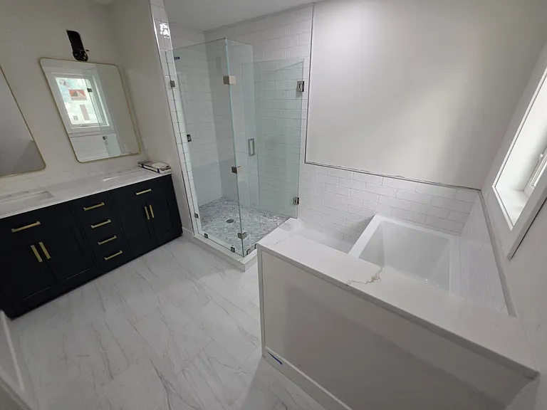 Master bath. Ceramic flooring throughout. Separate soaker tub and large walk in shower. Dual vanity.
