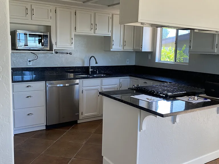 6091 Howell Dr — Photo 3