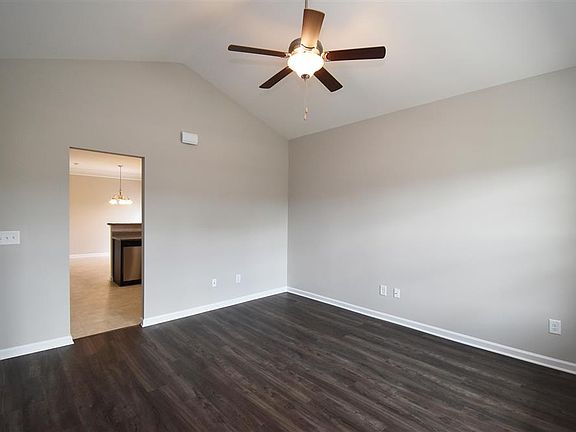 Family room with vaulted ceiling