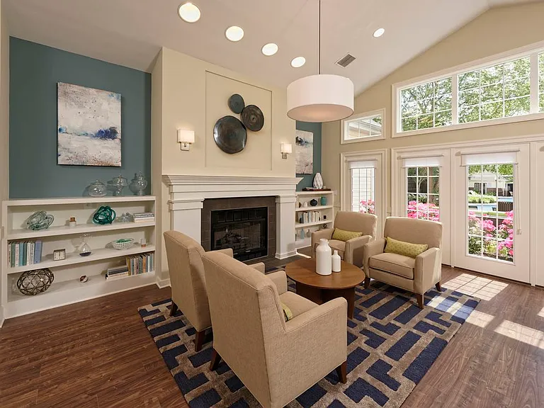 Leasing office with fireplace and lounge seating