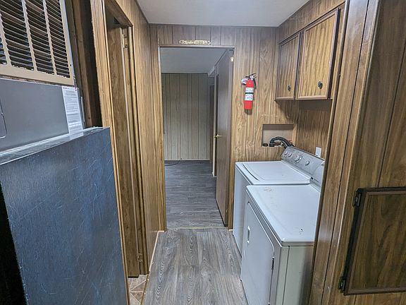 Full sized washer and dryer, and heat-pumped furnace, for heat and A/C.