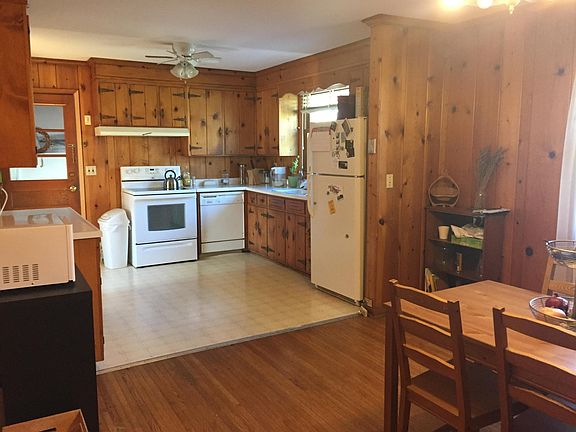 Dining area looking to kitchen