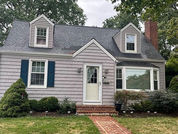 Front of home with sidewalk