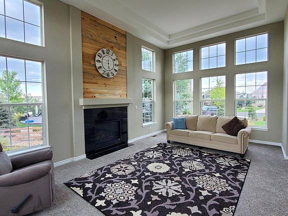 The light washes through the formal great room