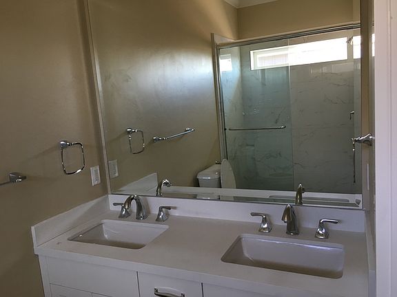 Master bedroom shower and vanity.