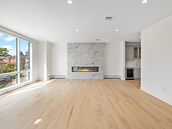 Another Shot of Living Room with Beautiful Hardwood Floors