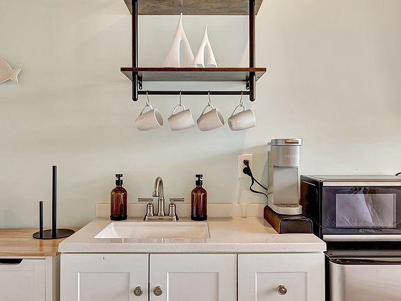 Kitchenette with Microwave and Coffee maker.