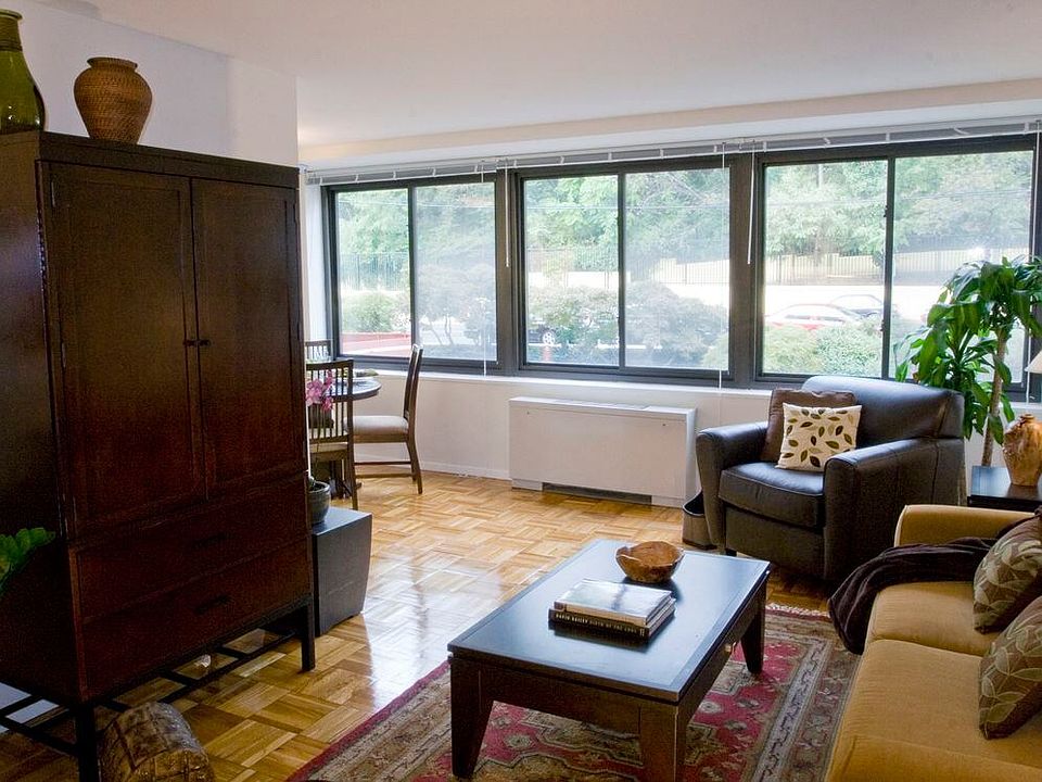 Living and dining areas with parquet flooring