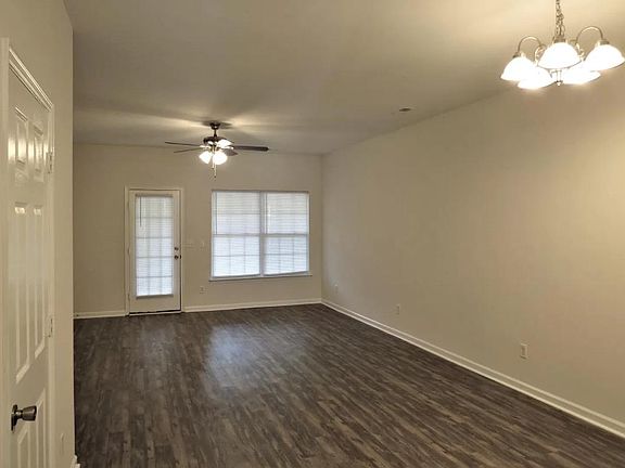 Den & Dining Rooms (half bath behind door)