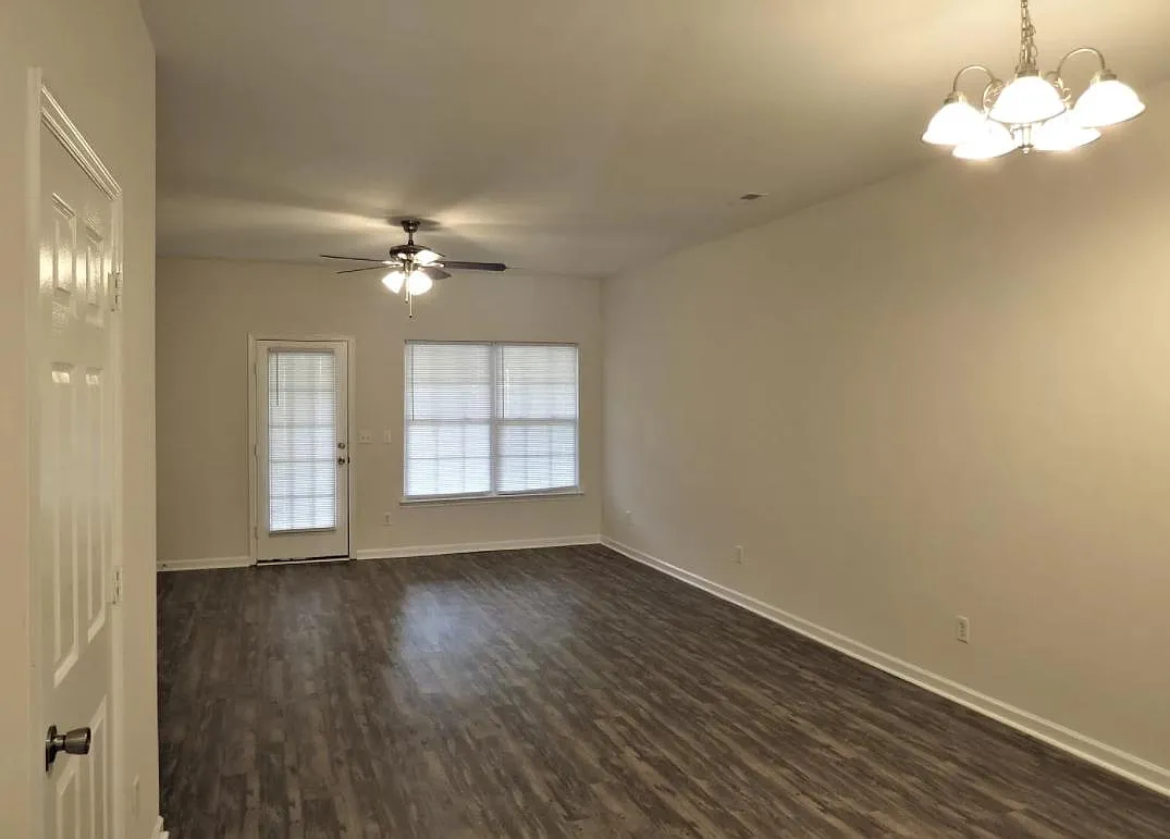 Den & Dining Rooms (half bath behind door) - 125 Pine Shadow Dr