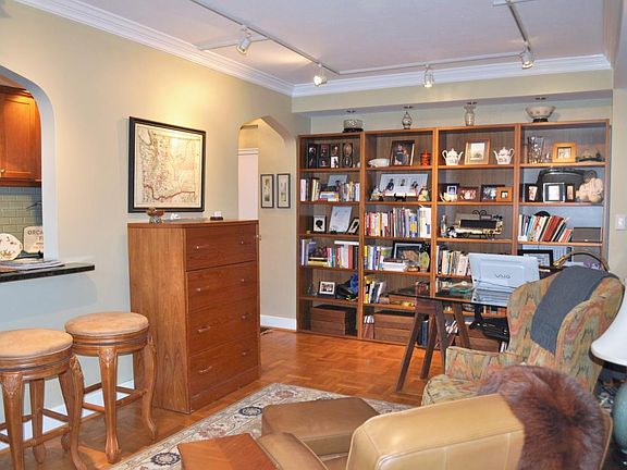Living room with built in bookshelves