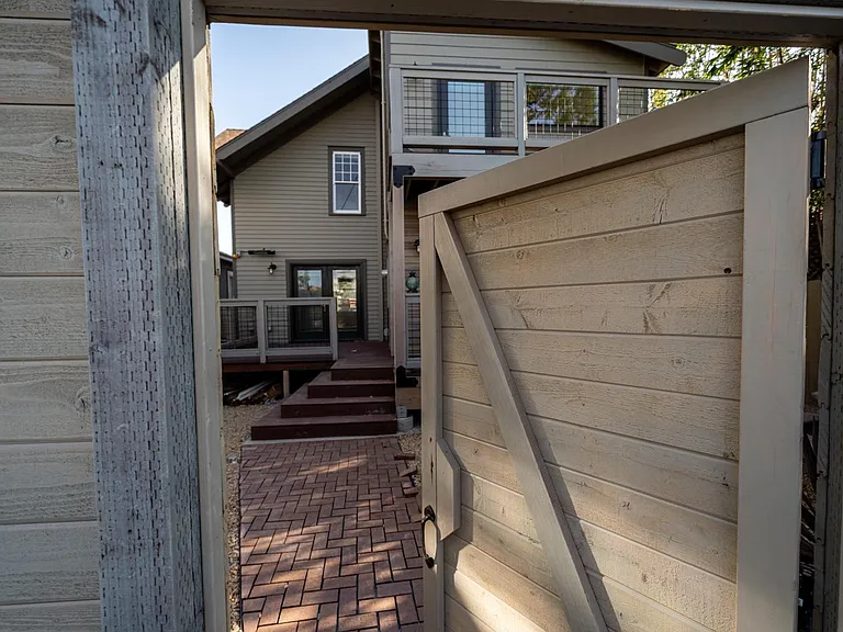 gate from alley to backyard. keypad coming soon