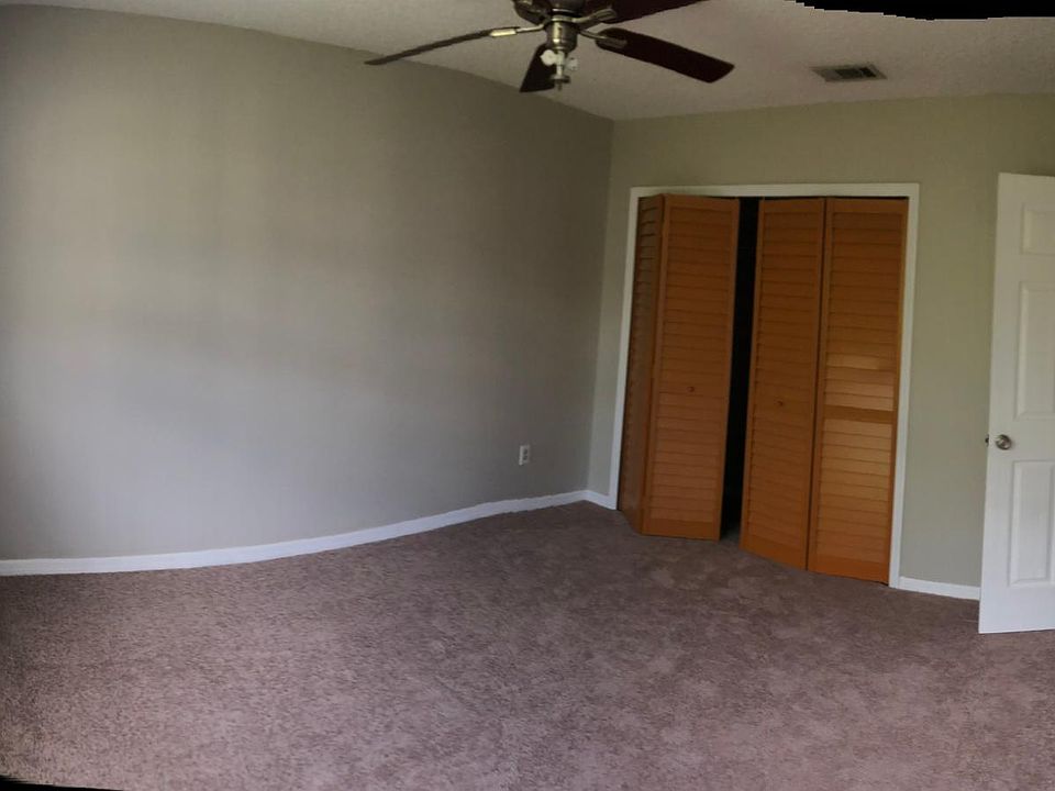Master bedroom with new carpet and new closet doors