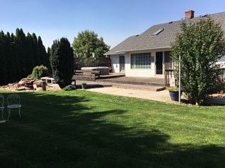 Rear deck, lawn and hot tub