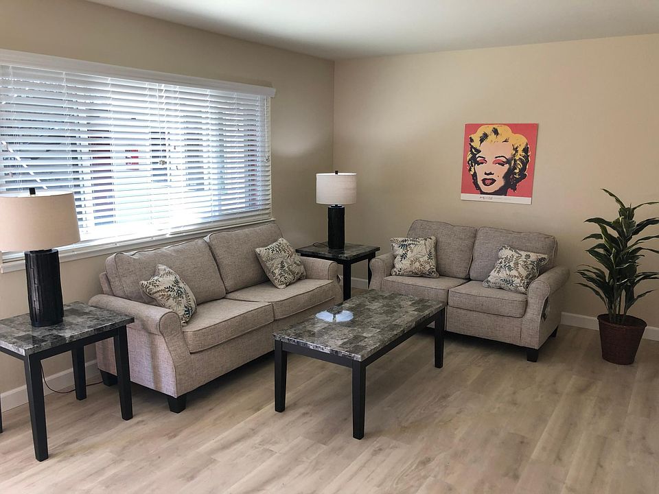Large separate living room easily furnished by you.