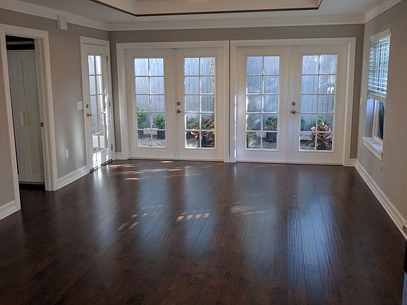 Open concept Living/Dining room with 5 French doors