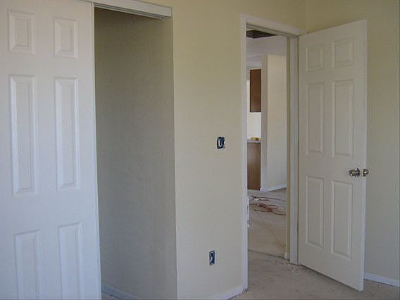 4 BRs w/ nice new doors, windows, new blinds and closet shelving.