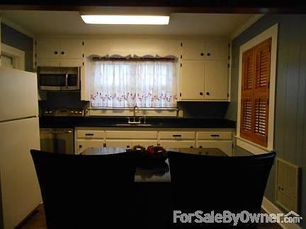 Granite Countertops!
						:
						New GE stove/oven/microwave! Like new refrigerator and washer/dryer.