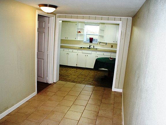 Tiled entry and dining