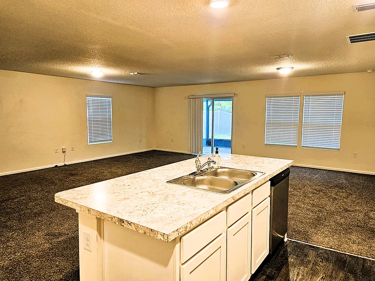 Kitchen island view toward lanai