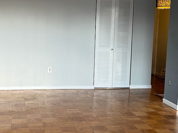 living/dining, looking at coat closet just off foyer