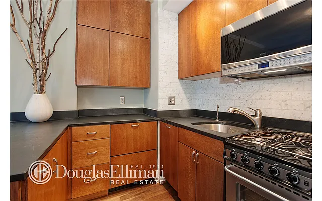 Sold by Douglas Elliman | media 18