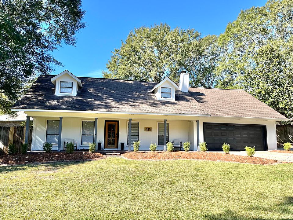 1st image of 411 Whispering Pines Dr