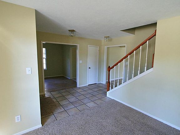 Inviting Entry flanked with study and formal dining.