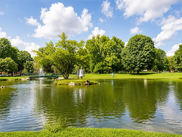 Walk one block to Schiller Park and its 23-acres of beautiful green space.