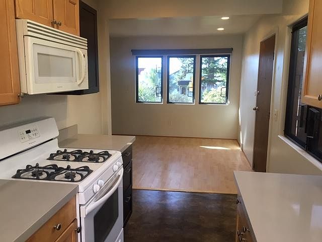 Kitchen to living room. View of front yard