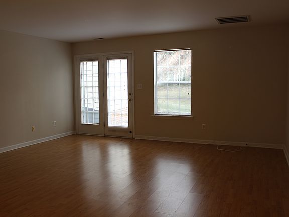Family room with patio back to woods