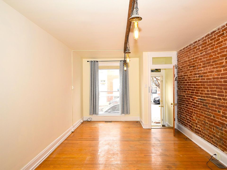 Classic row house with exposed brick