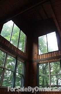 Cathedral Ceiling
						:
						24 ft ceiling brings the outdoors in with these windows!