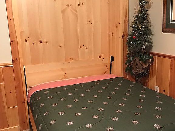 Lower level bed w/Murphy bed