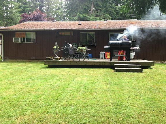 Large back yard with deck
