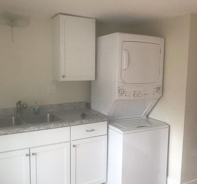 Kitchen with laundry area