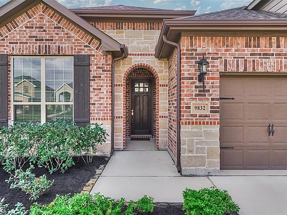 The brick and stone exterior is sure to impress.